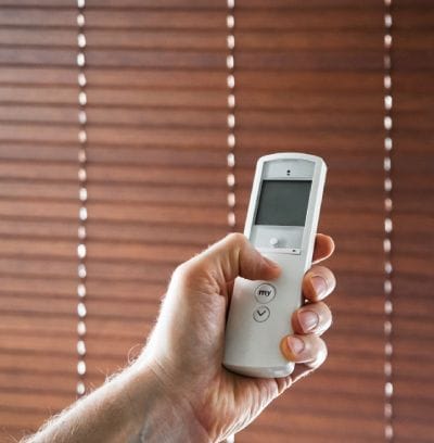 how to take down motorized blinds